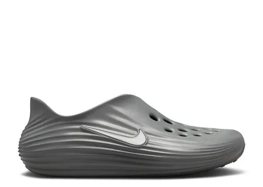 Nike ReactX Rejuven8 Smoke Grey casual slip-on featuring textured ripples and a white swoosh.