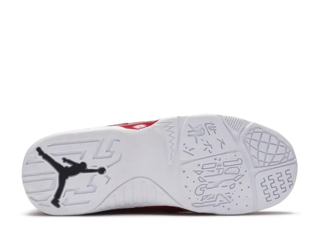Jordan 9 Retro PS White Black Gym Red kids basketball shoe outsole with Jumpman logo.