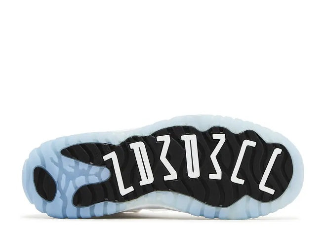 Kids Air Jordan 11 sneaker outsole: icy blue sole, black tread, white 11 branding.