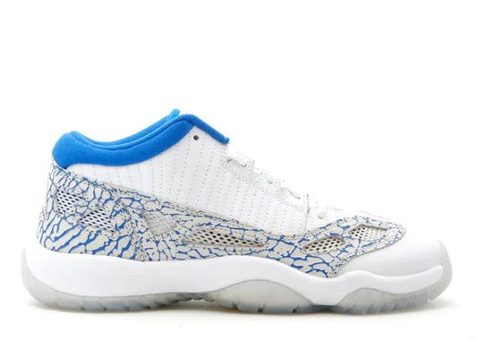 Jordan Air Jordan 11 Retro Low Boys Shoes in White, Royal Blue, Cement Grey elephant print.