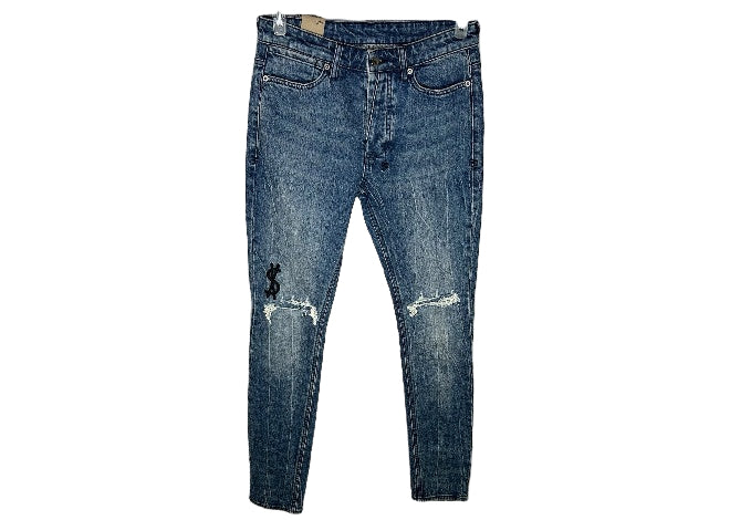 KSUBI blue acid wash ripped jeans with knee holes & black dollar sign embroidery.