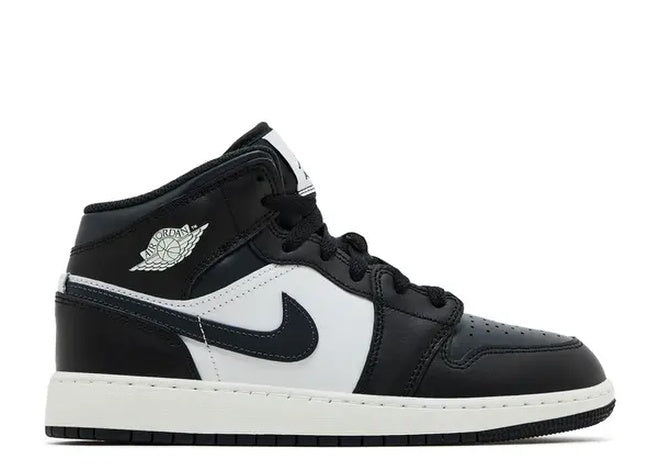 Nike Air Jordan 1 Mid GS Black White basketball shoes, iconic Wings logo.