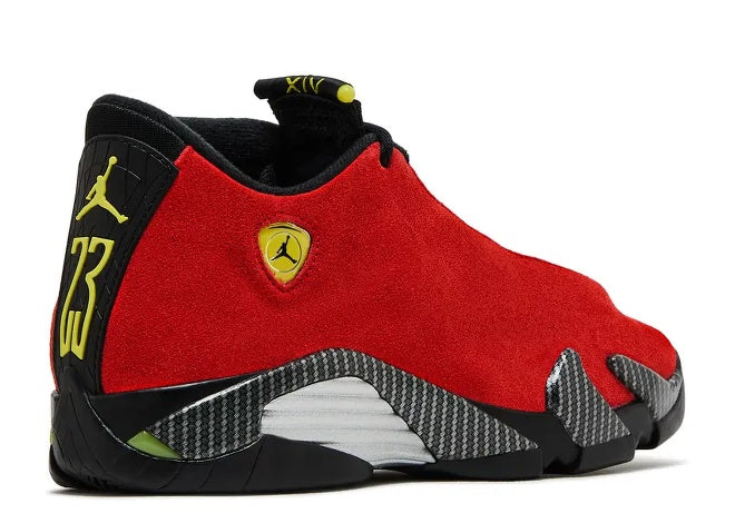 Air Jordan 14 GS Challenge Red/Black kids sneaker with suede upper, Jumpman, and carbon fiber details.