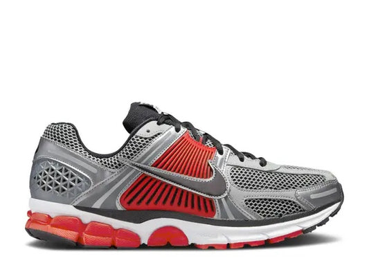 Nike Zoom Vomero 5 running shoe, grey, silver & red with mesh upper and ribbed side panels.