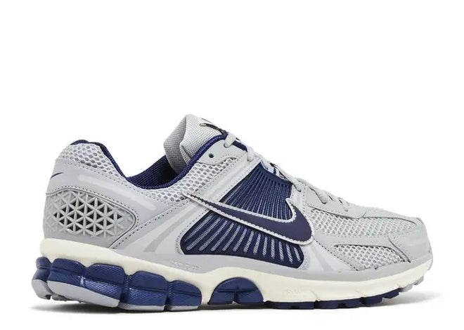Nike Zoom Vomero 5 Vast Grey and navy running shoes for comfort.