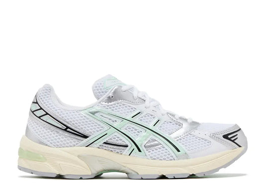 ASICS GEL-1130 womens white mesh & mint tint sneakers with silver details and cream sole, side view.