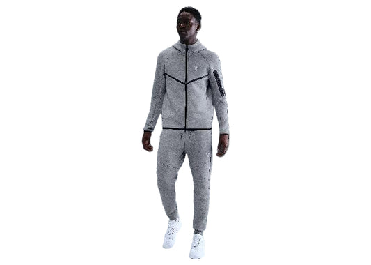 Model wears Nike Kobe Mens Grey Athletic Performance Pants & matching hoodie.