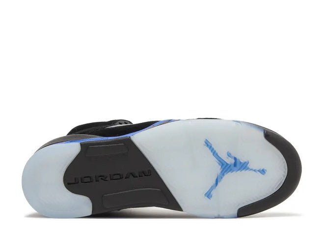 Air Jordan 5 Kids Black Racer Blue sneaker sole, translucent outsole with blue Jumpman logo and JORDAN text.