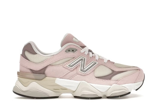 New Balance 9060 pink, white & grey sneaker with chunky sole.
