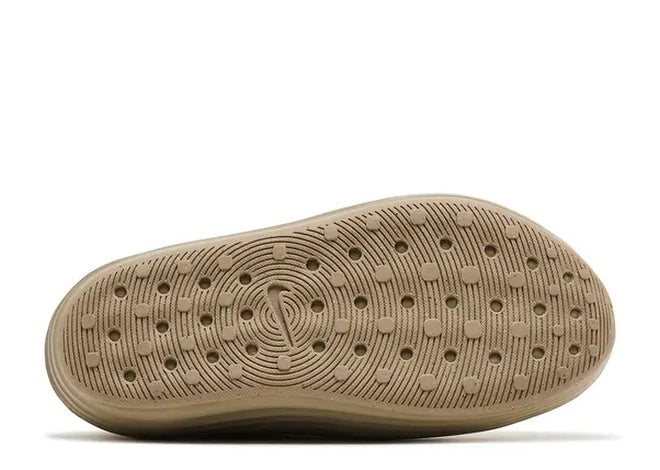 Nike ReactX Rejuven8 Mens Casual Khaki shoe outsole, unique circular tread, central Nike swoosh.