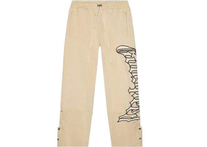 GODSPEED beige pants, black stylized bone embroidery, drawstring waist, snap cuffs.
