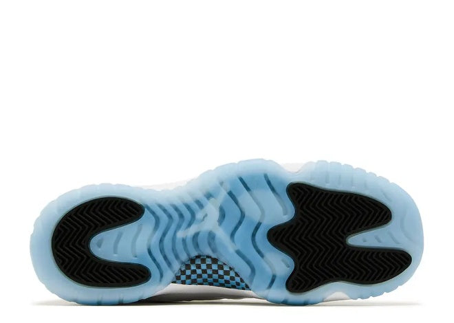 Air Jordan 11 Kids sneaker outsole. Legend Blue translucent sole, black traction, and checkerboard pattern.