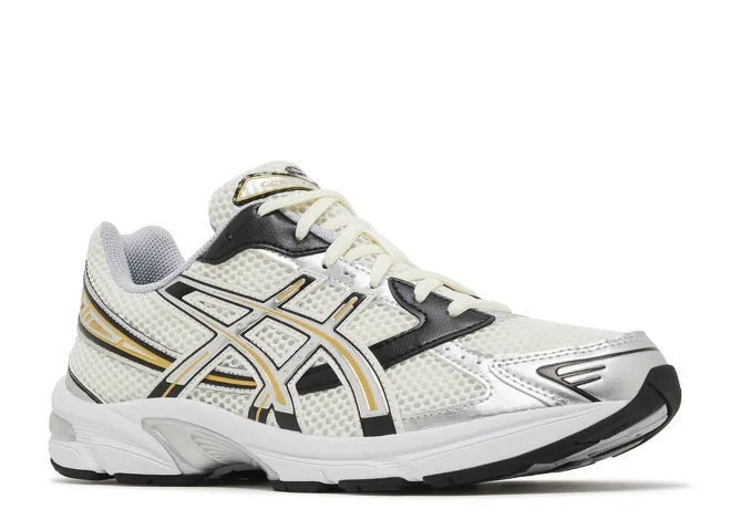 ASICS Gel 1130 mens sneaker in cream, black, and metallic silver.