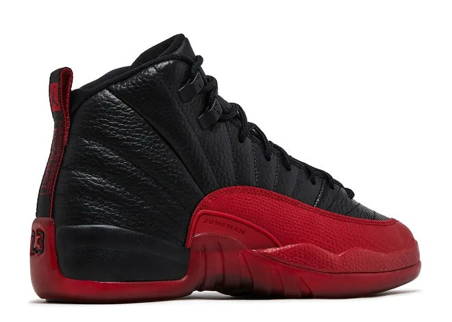 Side view of Air Jordan 12 Boys Black Varsity Red Kids Sneaker.