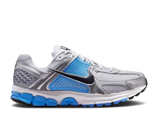 Nike Zoom Vomero 5 mens Pure Platinum, blue & black athletic shoes.