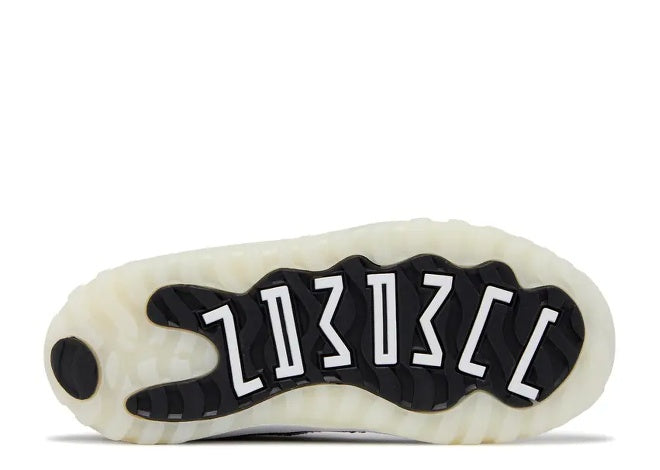 Air Jordan 11 Infants unisex white/black sneaker sole with stylized 23.