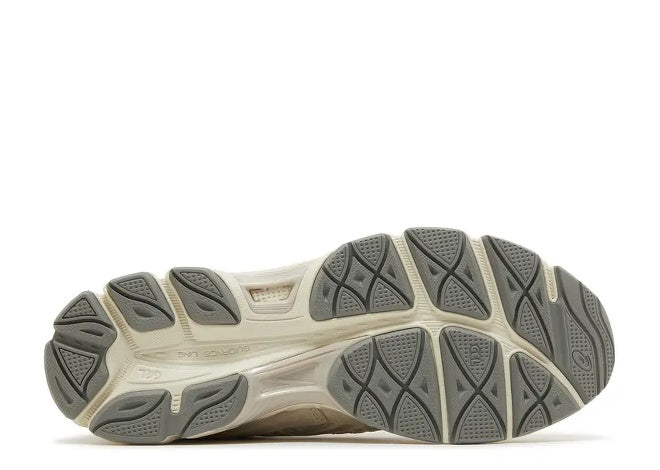 Asics Mens 1203A383 Smoke Grey sneaker with textured beige & grey traction sole.
