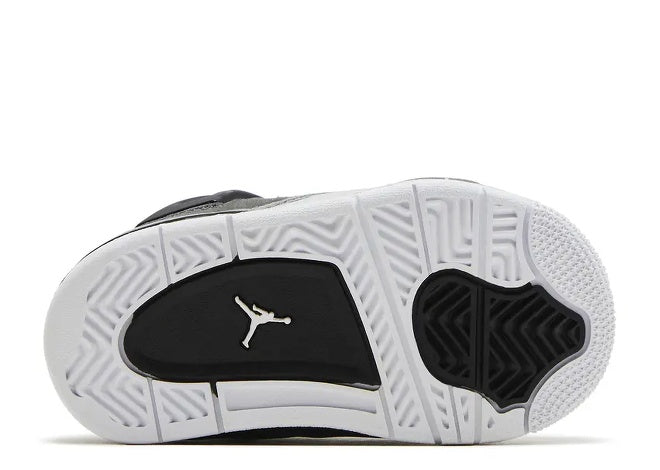 Air Jordan 4 TD kids black & white sneaker sole with Jumpman logo.
