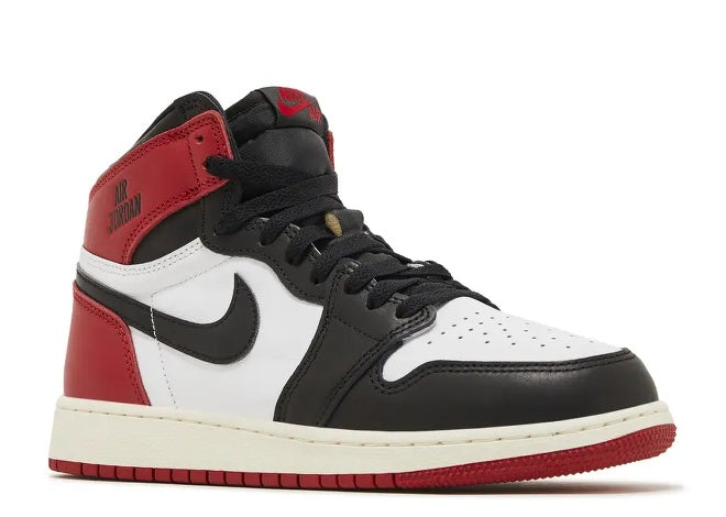 Kids Air Jordan 1 High sneaker in white, black, red, and sail colors.