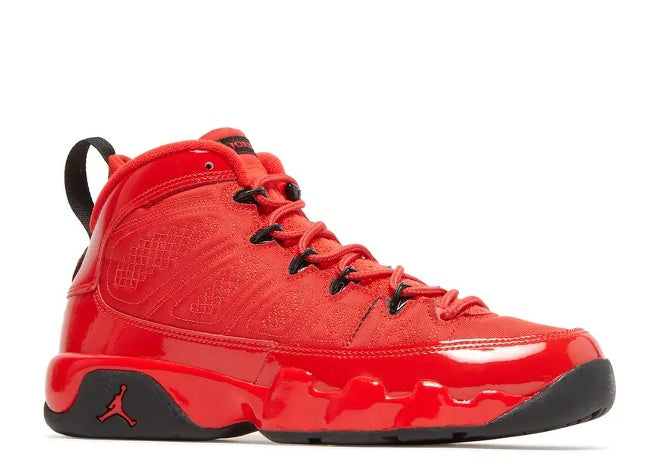 Air Jordan 9 Retro Chile Red boys sneaker with patent leather accents & black sole.