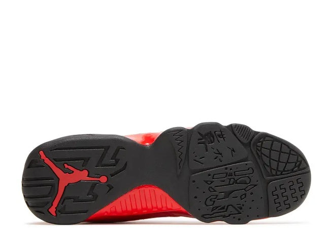 Air Jordan 9 Kids red black sneaker outsole with Jumpman logo.
