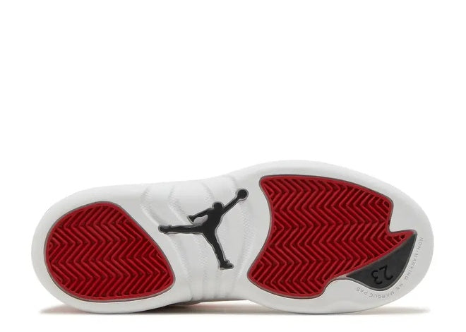 Outsole of Air Jordan 12 PS Kids Gym Red/White sneaker with Jumpman logo & 23.