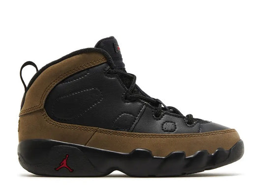 Air Jordan 9 Infants unisex sneaker, black & light olive, with red Jumpman logo.