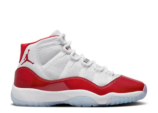 Kids Air Jordan 11 sneakers: white, varsity red patent leather, and red Jumpman logo.