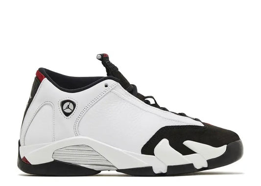 Kids Air Jordan 14 sneaker, white leather upper with black suede toe and varsity red accents.