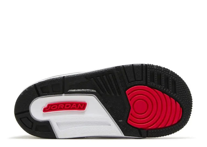 Kids Air Jordan 3 sneaker sole in black, white, and siren red, with Jordan logo and circular traction.