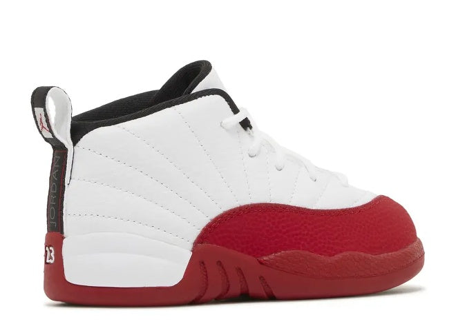 Air Jordan 12 Infants white and varsity red sneaker.