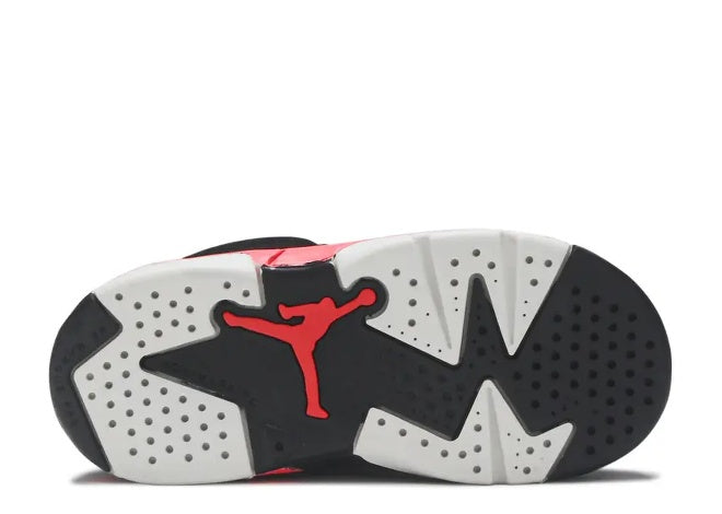 Air Jordan 6 Infants BLK/Infrared 23 sneaker sole, featuring a red Jumpman logo and black/white traction pattern.