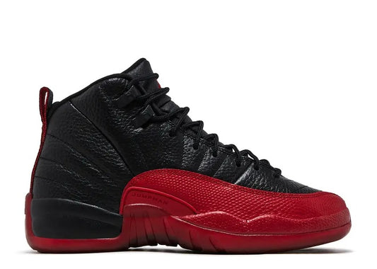 Air Jordan 12 Flu Game kids sneaker, black and varsity red.