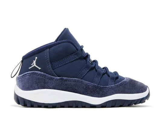 Air Jordan 11 TD Midnight Navy Metallic Silver toddler sneaker with white midsole.