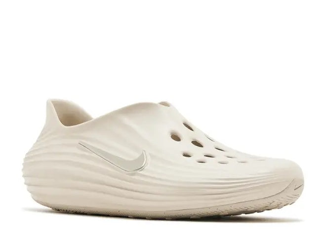 Orewood Brown Nike ReactX ReJuen8 mens casual slip-on shoes with perforations.