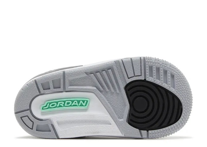 Air Jordan 3 TD toddler sneaker outsole. Wolf Grey, Green Glow logo, Black heel.