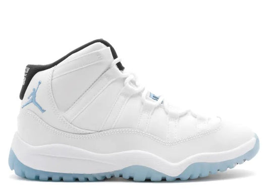 White Air Jordan 11 PS kids sneaker with Legend Blue sole and black collar, ideal for young feet.