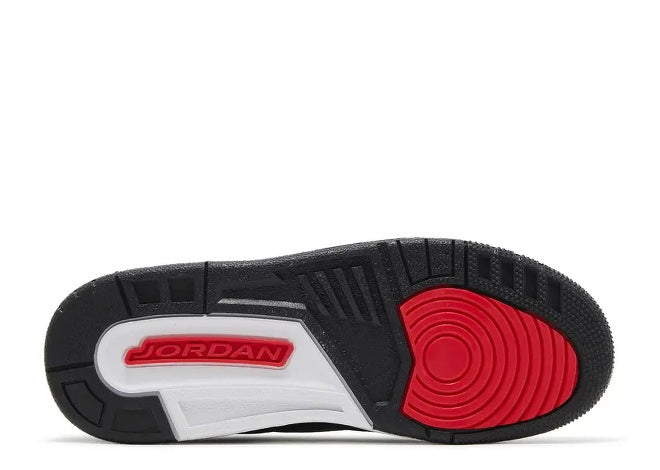 Air Jordan 3 GS sneaker sole: black, white, and siren red, with red JORDAN logo.