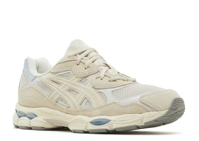 Asics 1203A383 mens cream sneakers with light blue details.